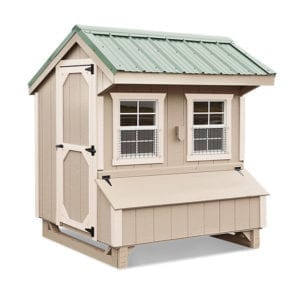 lovely beige on beige amish chicken coop with green metal roof